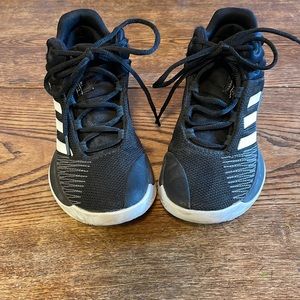 Adidas basketball shoes size 4 big kid good used condition. Black and white.